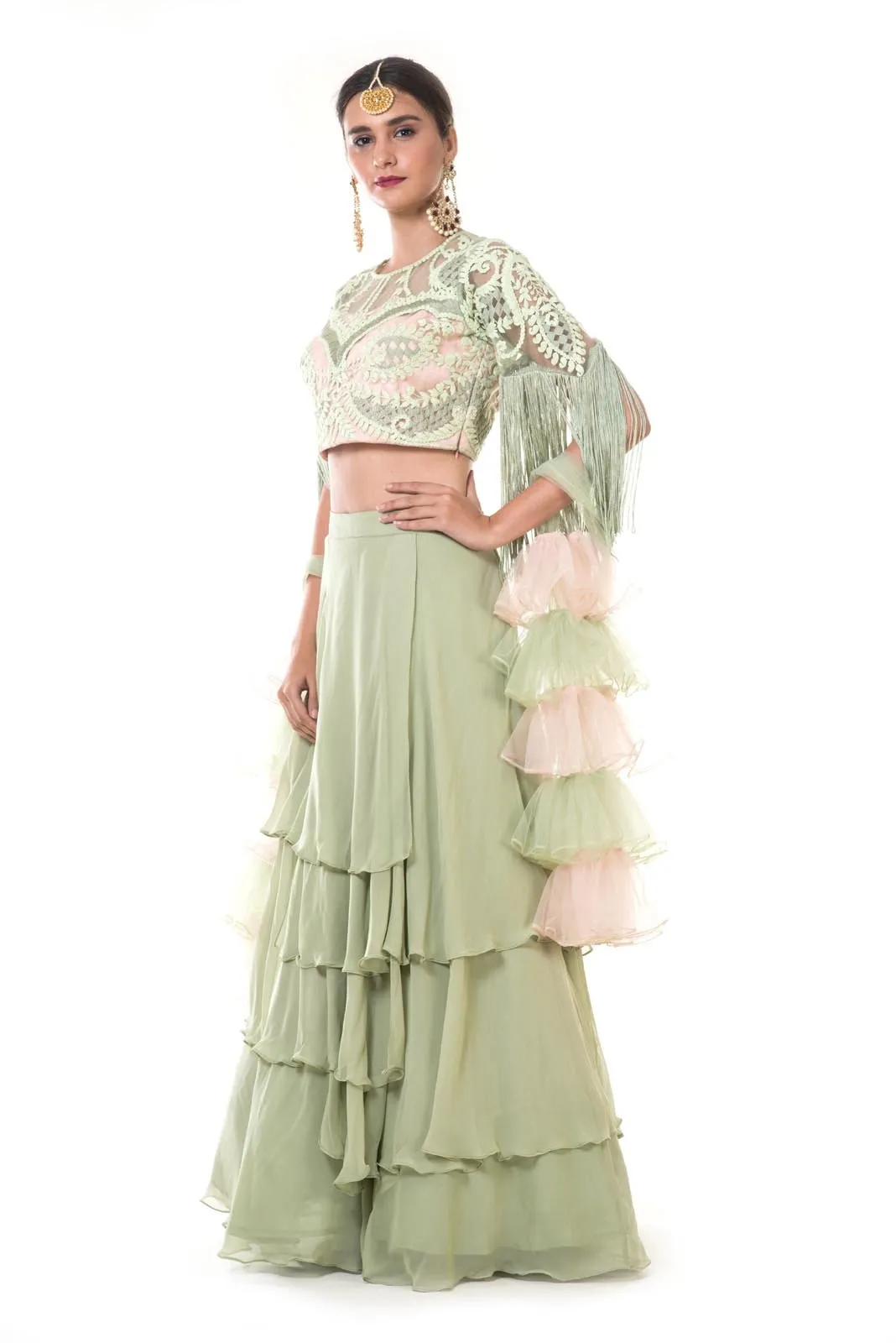 Green Layered Skirt with Heavy Hand Embroidered Blouse with Fringes and Ruffle Net Dupatta