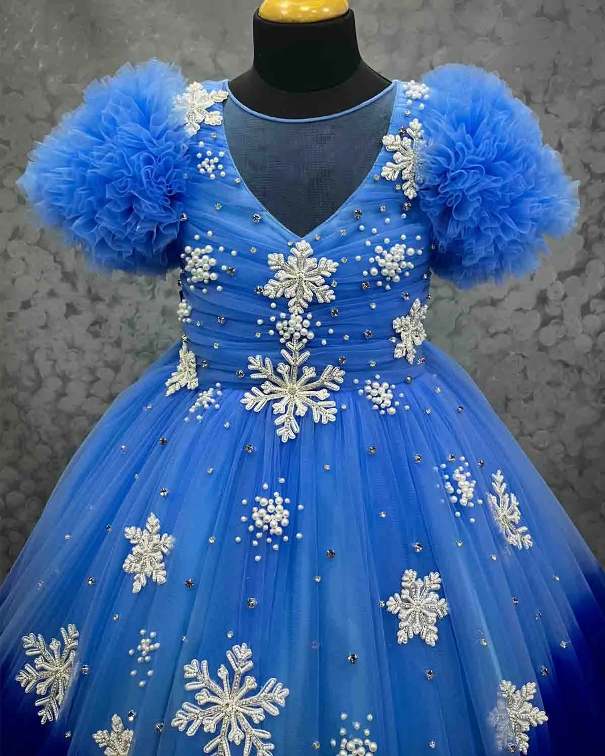 Snowflake theme light cobalt blue shade and dark royal blue layered frilled gown