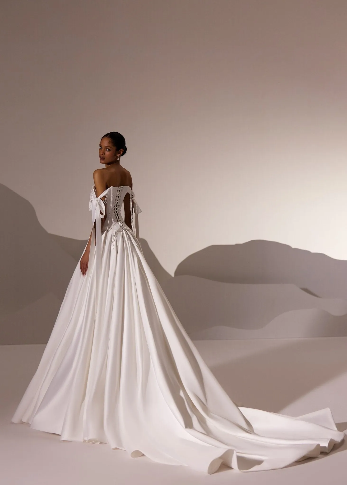 White Off-Shoulder Corset Wedding Gown with Draped Bodice and Flowing Train - Plus Size