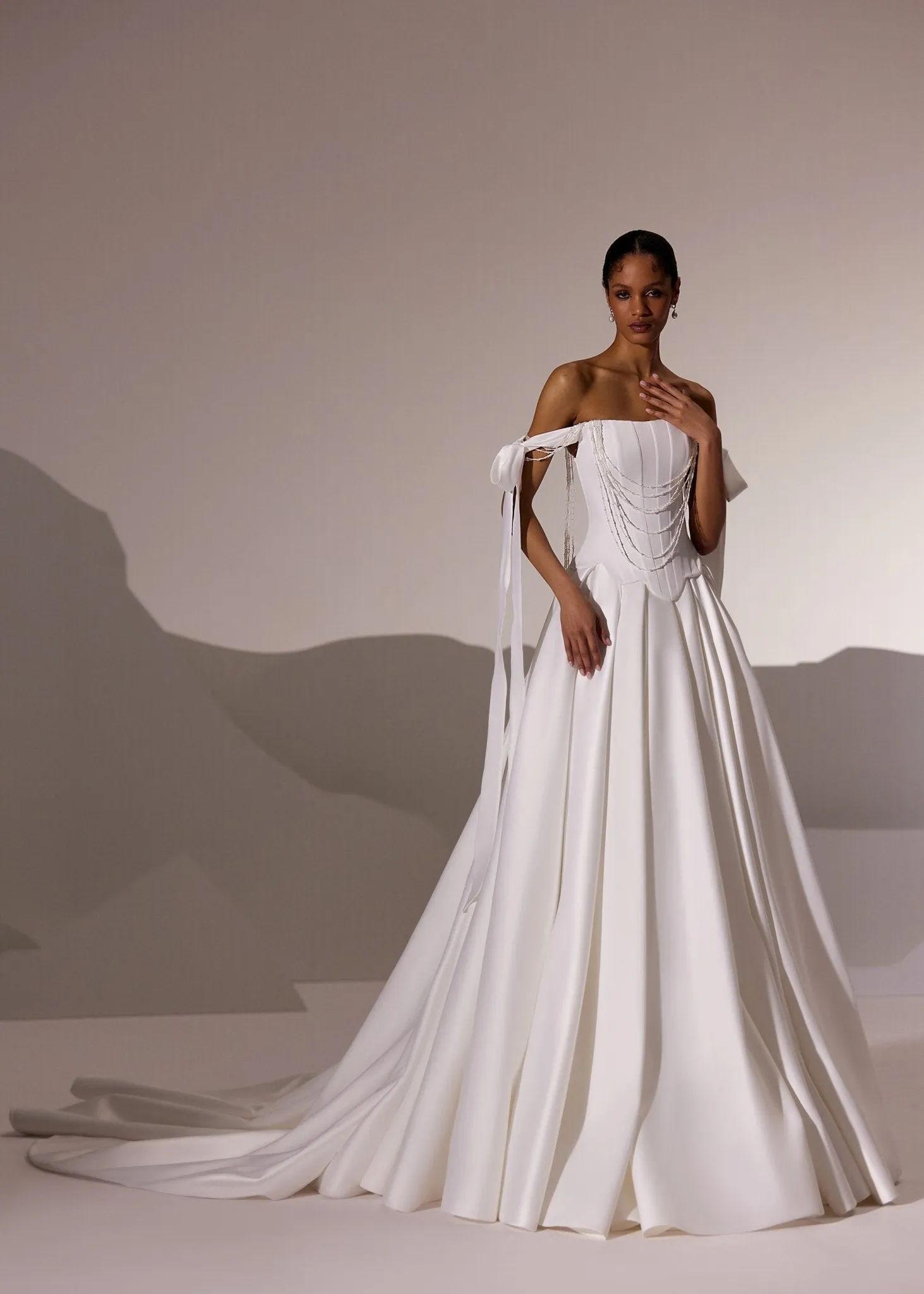 White Off-Shoulder Corset Wedding Gown with Draped Bodice and Flowing Train - Plus Size