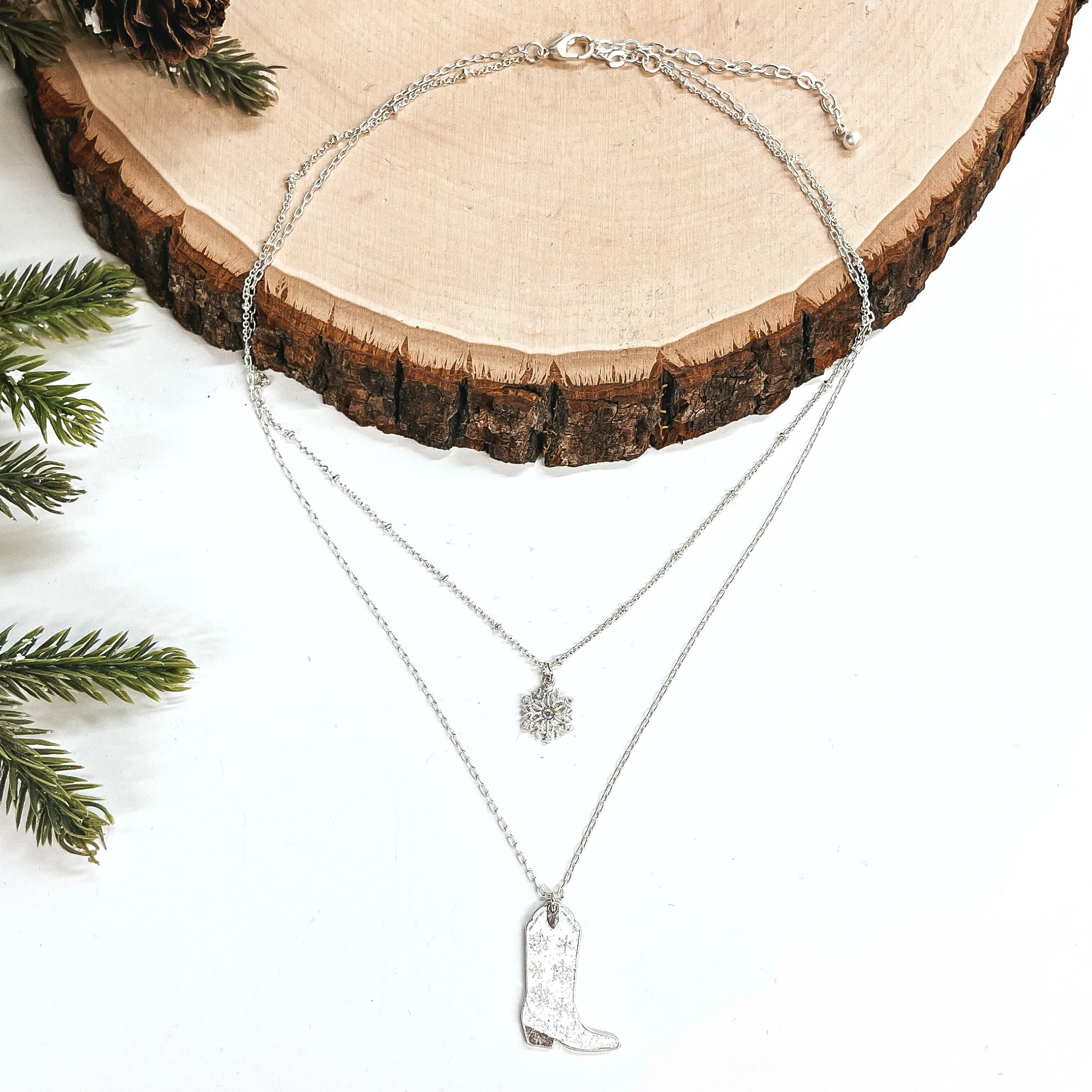 Winter Fate Double Strand Silver Tone Necklace with Silver Tone Snowflake and Snowflake Patterned Boot Pendant in White